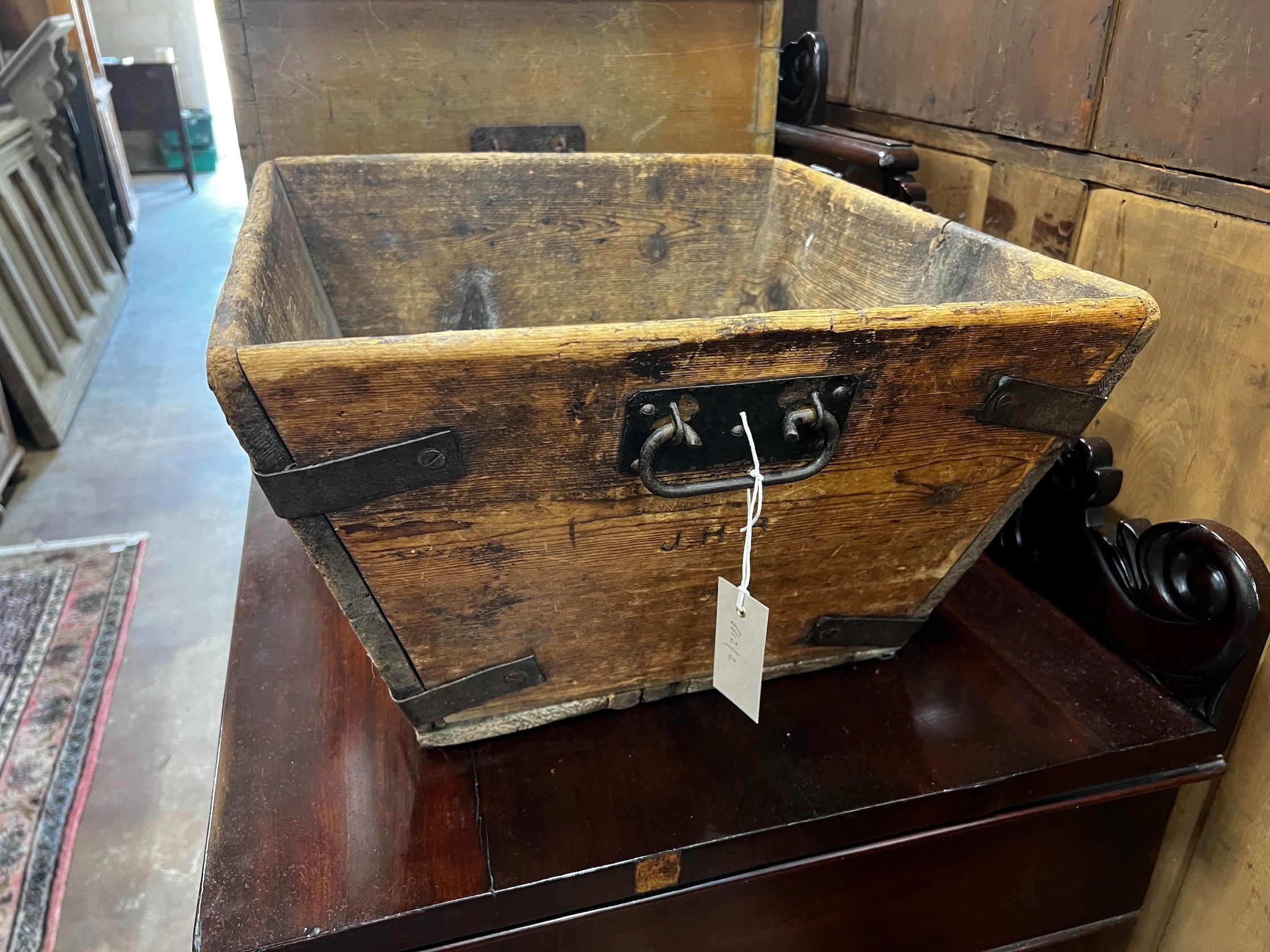 A Victorian iron bound pine garden trough, initialled J H B, width 47cm depth 45cm height 27cm